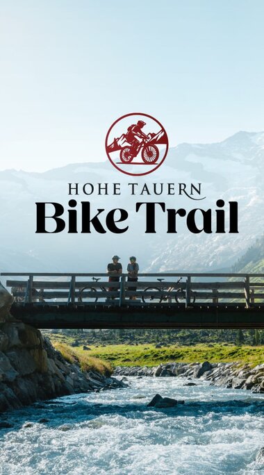 Mountainbiker auf Brücke am Hohe Tauern Bike Trail im Krimmler Achental | © Ferienregion Nationalpark Hohe Tauern - Mathäus Gartner